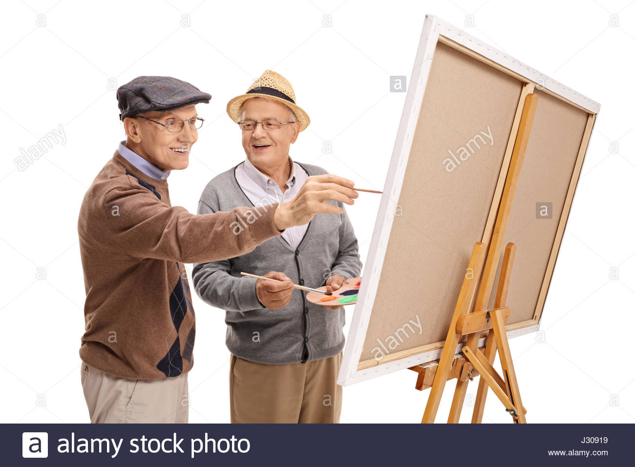 two-happy-mature-men-painting-on-a-canvas-isolated-on-white-background-J30919.jpg